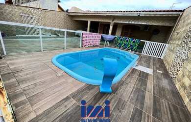 Imagem: A casa possui 5 Dormitórios, 2 Banheiros, 1 Vaga na garagem