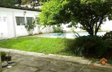 Imagem: A casa possui 4 Dormitórios, 4 Banheiros, 3 Vagas na garagem