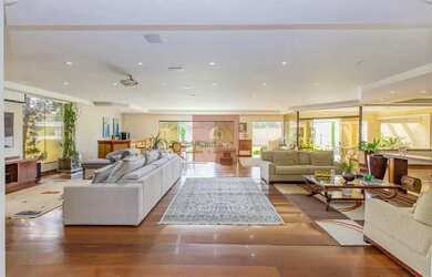 Imagem: A casa possui 4 Dormitórios, 5 Banheiros, 5 Vagas na garagem