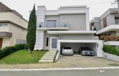 Imagem: A casa em condomínio possui 4 Dormitórios, 5 Banheiros, 4