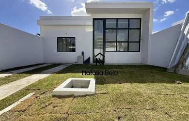 Imagem: A casa possui 3 Dormitórios, 2 Banheiros, 2 Vagas na garagem