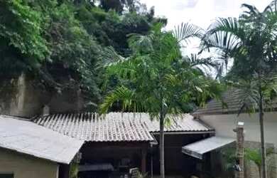 Imagem: A casa possui 5 Dormitórios, 5 Banheiros, 5 Vagas na garagem