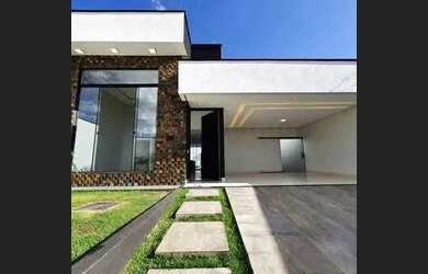 Imagem: A casa possui 3 Dormitórios, 3 Banheiros, 2 Vagas na garagem