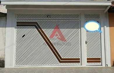 Imagem: A casa possui 3 Dormitórios, 1 Banheiro, 2 Vagas na garagem