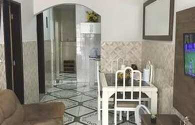 Imagem: A casa possui 3 Dormitórios, 1 Banheiro, 1 Vaga na garagem