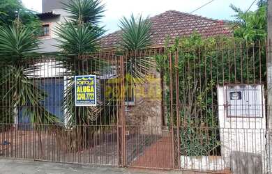 Imagem: A casa possui 3 Dormitórios, 2 Banheiros, 1 Vaga na garagem