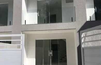 Imagem: A casa possui 2 Dormitórios, 3 Banheiros, 1 Vaga na garagem