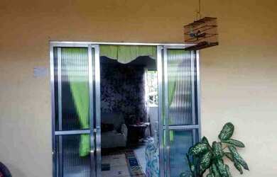 Imagem: A casa possui 2 Dormitórios, 1 Banheiro, 1 Vaga na garagem