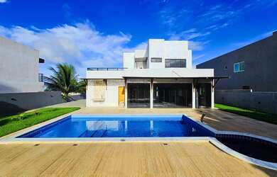 Imagem: A casa em condomínio possui 4 Dormitórios, 4 Banheiros, 5