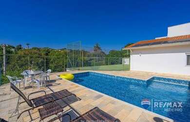 Imagem: A casa em condomínio possui 4 Dormitórios, 5 Banheiros, 5