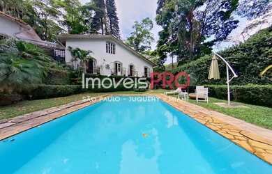 Imagem: A casa à venda possui 4 Dormitórios, 5 Banheiros, 5 Vagas