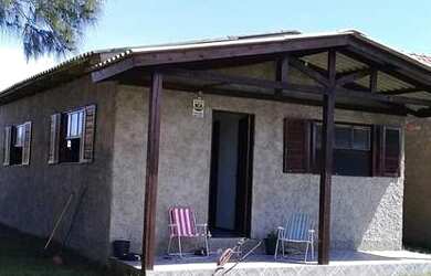 Imagem: A casa possui 3 Dormitórios, 2 Banheiros e está localizado