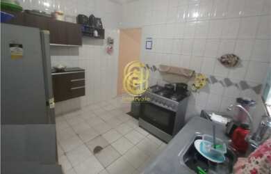 Imagem: A casa possui 2 Dormitórios, 1 Banheiro, 2 Vagas na garagem