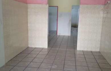 Imagem: A casa possui 2 Dormitórios, 2 Banheiros e 1 Vaga na garagem