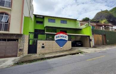 Imagem: A casa possui 5 Dormitórios, 4 Banheiros, 4 Vagas na garagem