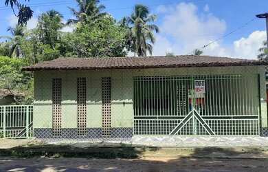 Imagem: A casa possui 4 Dormitórios e 2 Vagas na garagem e está localizado