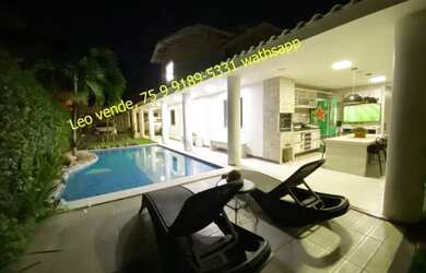 Imagem: A casa possui 3 Dormitórios, 4 Banheiros, 3 Vagas na garagem