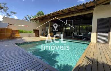 Imagem: A casa possui 5 Dormitórios, 5 Banheiros, 3 Vagas na garagem