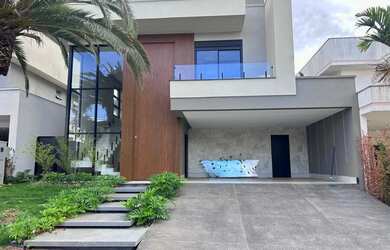 Imagem: A casa em condomínio possui 4 Dormitórios, 5 Banheiros, 4