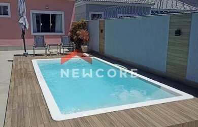 Imagem: A casa possui 2 Dormitórios, 3 Banheiros, 1 Vaga na garagem