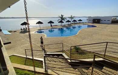 Imagem: A casa possui 4 Dormitórios, 2 Vagas na garagem e está localizado