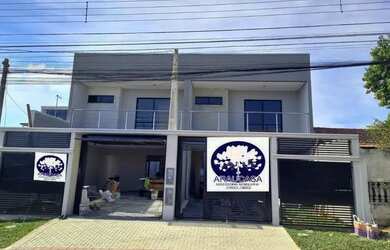 Imagem: A casa à venda possui 1 Dormitório, 3 Banheiros, 2 Vagas na