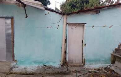 Imagem: A casa possui 2 Dormitórios, 1 Banheiro, 1 Vaga na garagem