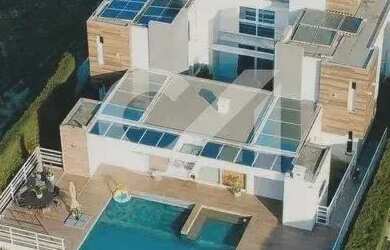 Imagem: A casa em condomínio possui 4 Dormitórios, 5 Banheiros, 4