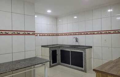 Imagem: A casa possui 2 Dormitórios, 3 Banheiros, 3 Vagas na garagem