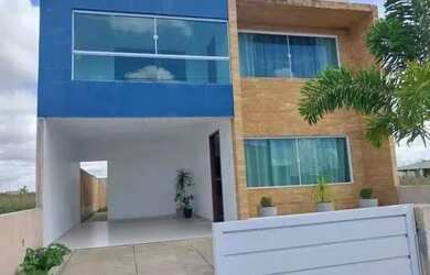 Imagem: A casa possui 3 Dormitórios, 2 Banheiros, 2 Vagas na garagem