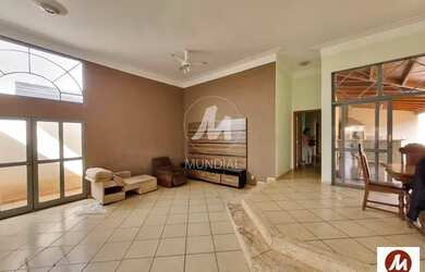 Imagem: A casa possui 4 Dormitórios, 4 Banheiros, 4 Vagas na garagem