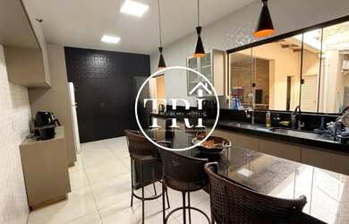 Imagem: A casa possui 3 Dormitórios, 5 Banheiros, 3 Vagas na garagem