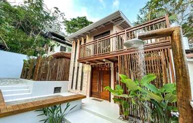 Imagem: A casa possui 2 Dormitórios, 4 Banheiros, 2 Vagas na garagem