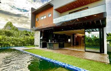 Imagem: A casa em condomínio possui 5 Dormitórios, 5 Banheiros, 4