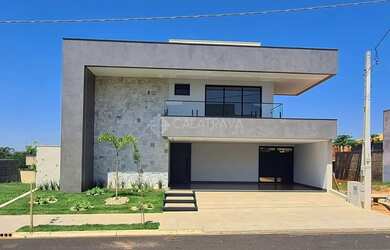 Imagem: A casa em condomínio possui 4 Dormitórios, 5 Banheiros, 304m²