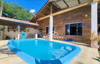 Imagem: A casa possui 5 Dormitórios, 1 Banheiro, 5 Vagas na garagem