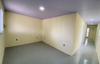 Imagem: A casa possui 2 Dormitórios, 3 Banheiros, 1 Vaga na garagem