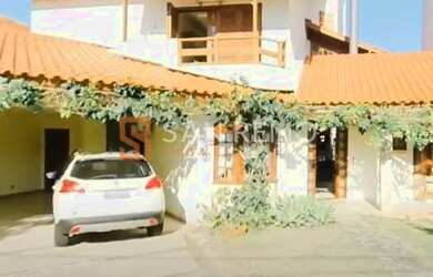 Imagem: A casa possui 5 Dormitórios, 5 Banheiros, 2 Vagas na garagem