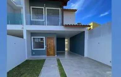 Imagem: A casa possui 3 Dormitórios, 2 Banheiros, 4 Vagas na garagem