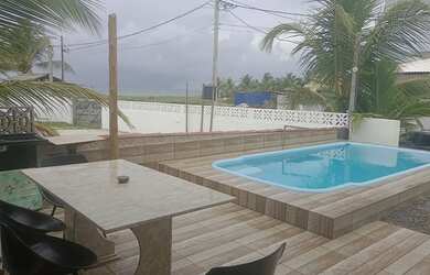 Imagem: A casa possui 2 Dormitórios, 2 Vagas na garagem e está localizado