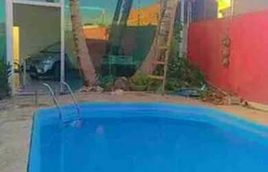 Imagem: A casa possui 4 Dormitórios, 3 Banheiros e 3 Vagas na garagem