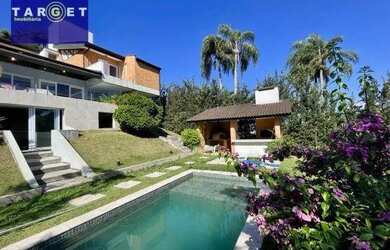 Imagem: A casa em condomínio possui 4 Dormitórios, 5 Banheiros, 4