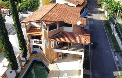 Imagem: A casa possui 3 Dormitórios, 3 Banheiros, 3 Vagas na garagem