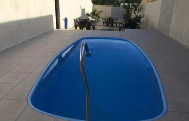 Imagem: A casa à venda possui 4 Dormitórios, 4 Banheiros, 5 Vagas