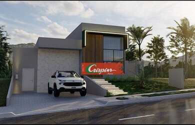 Imagem: A casa possui 3 Dormitórios, 2 Banheiros, 2 Vagas na garagem