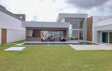 Imagem: A casa em condomínio possui 4 Dormitórios, 4 Banheiros, 5