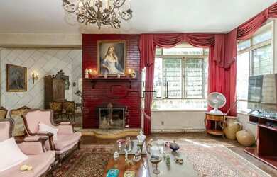 Imagem: A casa possui 3 Dormitórios, 3 Banheiros, 5 Vagas na garagem