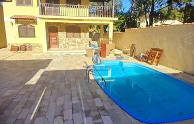 Imagem: A casa à venda possui 5 Dormitórios, 2 Banheiros, 2 Vagas