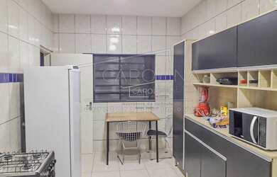 Imagem: A casa possui 2 Dormitórios, 2 Banheiros, 122m² de Área e