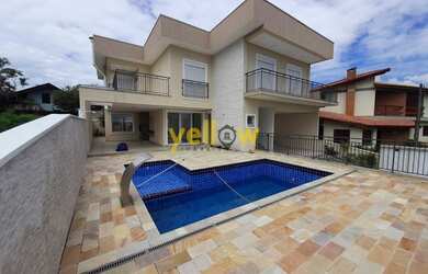 Imagem: A casa em condomínio possui 4 Dormitórios, 5 Banheiros, 4